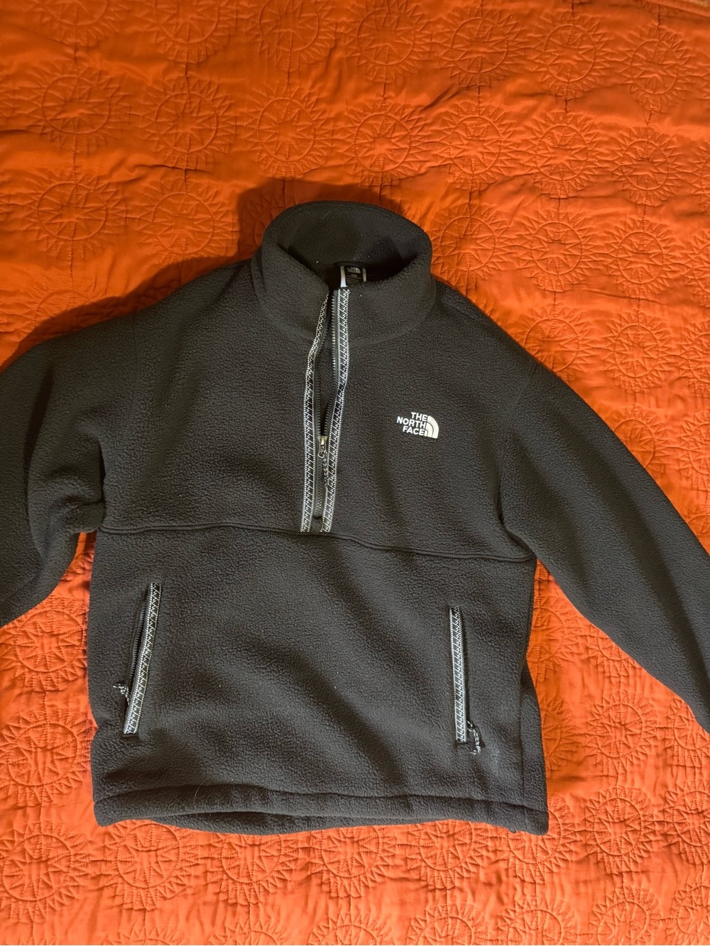 The North Face Black Fleece Jacket with White Tag Detail